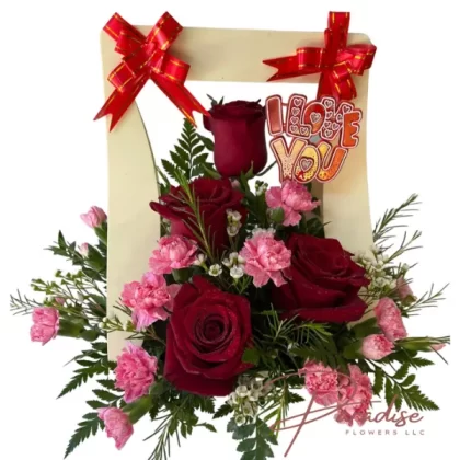 For You, My Love box arrangement with four red roses, pink mini carnations, and lush greenery.