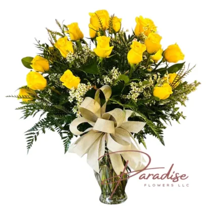 Two dozen yellow roses in a vase, symbolizing joy, affection, and warmth.