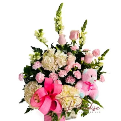 Little Blessings bouquet featuring snapdragons, pink roses, mini carnations, white hydrangeas, and an adorable teddy bear.