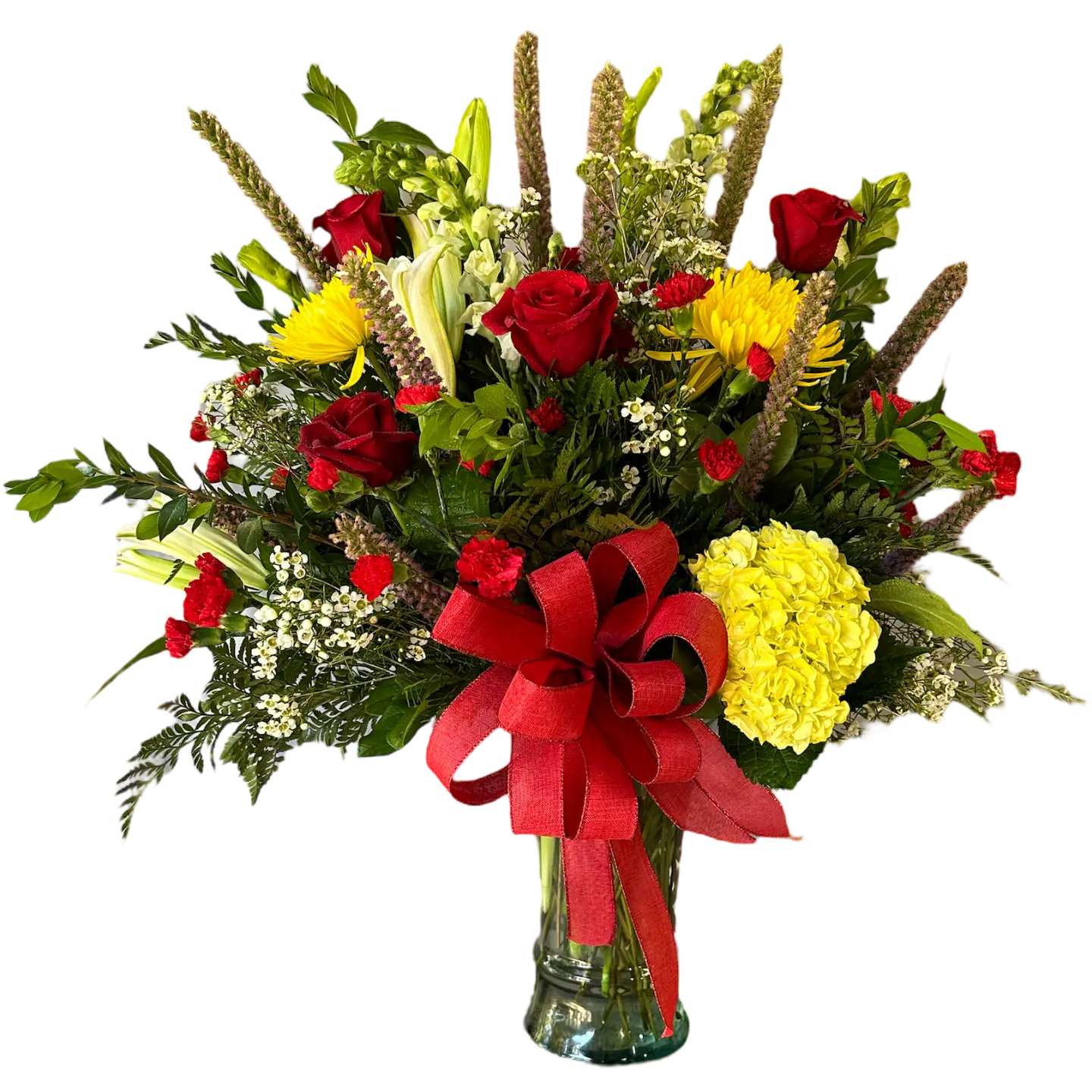 Majestic floral arrangement with red roses, lilies, white snapdragons, liatris, red mini carnations, yellow spider flowers, yellow hydrangea, white waxflower, and greenery.