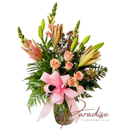 Mom's Bloom – Mother's Day pink flower arrangement with pink spray roses and lilies in a clear glass vase