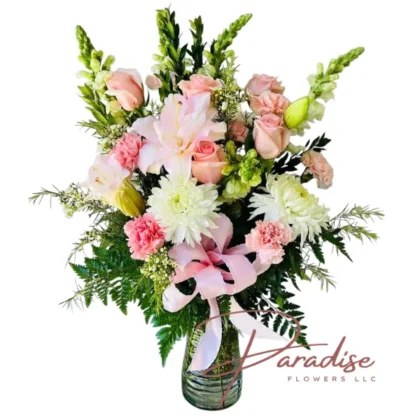 Love for Mom – Mother's Day flower bouquet with peach roses, pink lilies, pink carnations, white chrysanthemums and pink ribbon in a glass vase